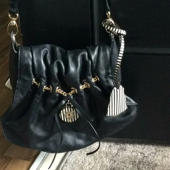 Beautiful Henri Bendel new without tags.